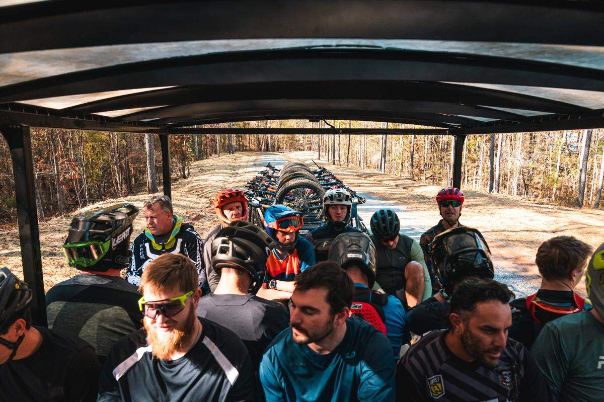 Riders take the shuttle to the summit on opening day at Fairfield County’s Rattlesnake Bike Park. Nov. 16, 2024