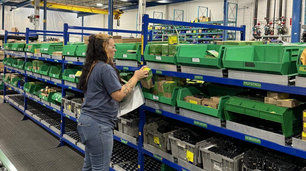 An employee works at Schneider Electric’s Seneca, SC facility.