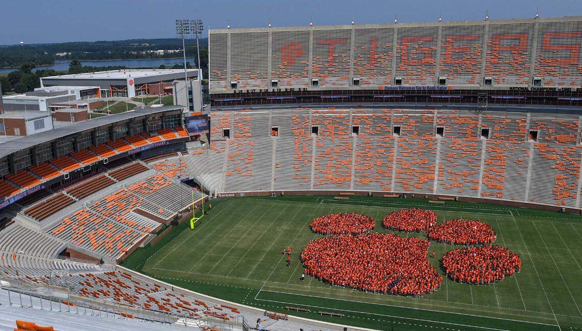 New Clemson University students gather for the Tiger Paw shaped Entering Year Photo inside Memorial Stadium, Friday, August 21, 2023.