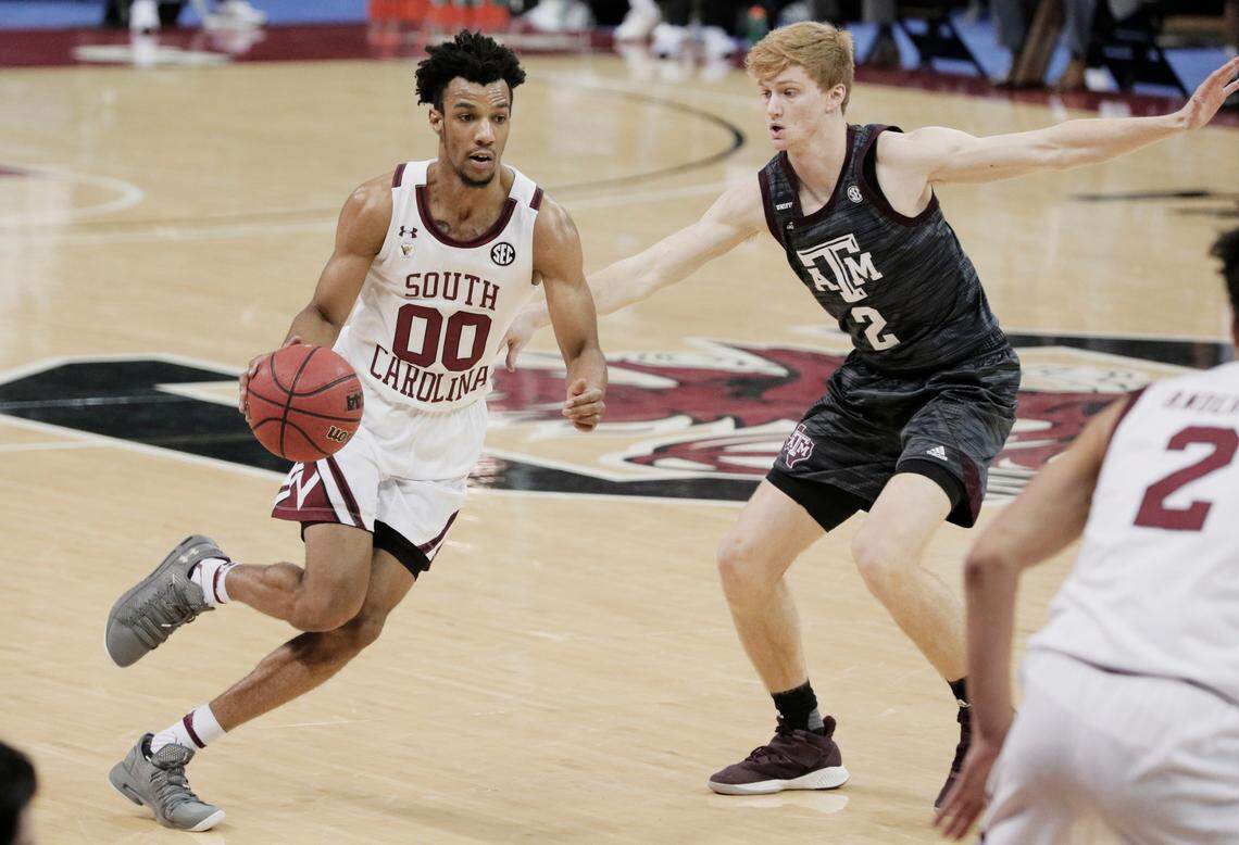 South Carolina Gamecocks guard AJ Lawson (00) is guarded by Texas A&M Aggies guard Hayden Hefner (2) at Colonial Life Arena on Wednesday, January 6, 2021.