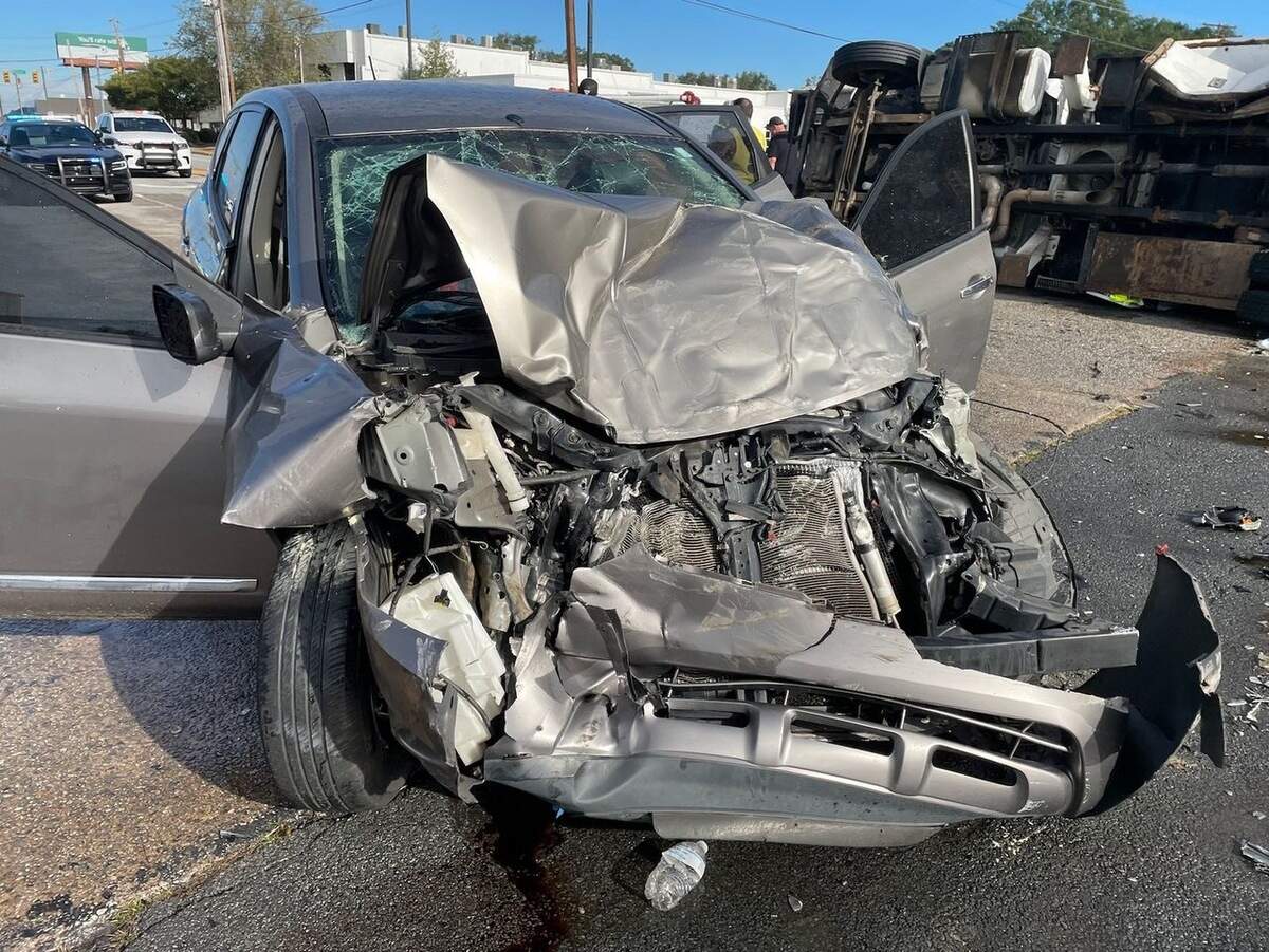 An image of a crushed vehicle from a two vehicle wreck in Greenville. The wreck was caused by drivers speeding through traffic lights without power because of Helene storm damage, police say.