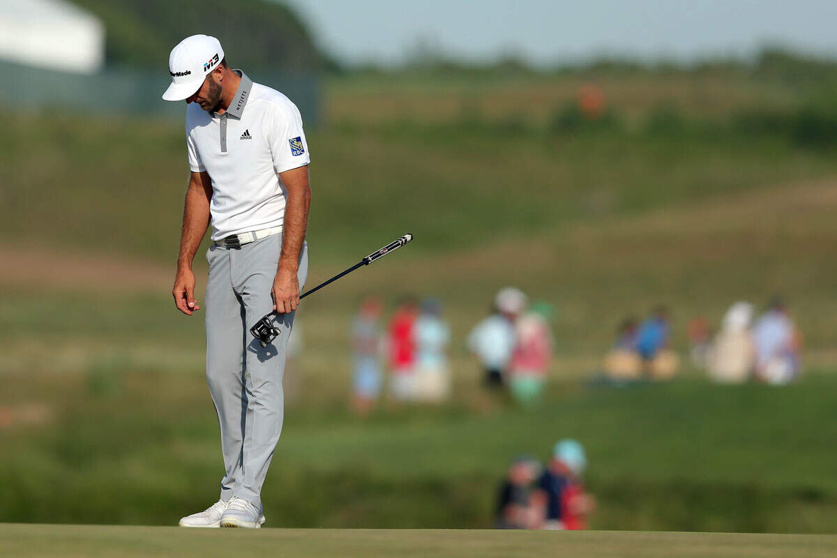 Dustin Johnson reacts on the 17th green during the final round of the 2018 U.S. Open golf tournament at Shinnecock Hills.