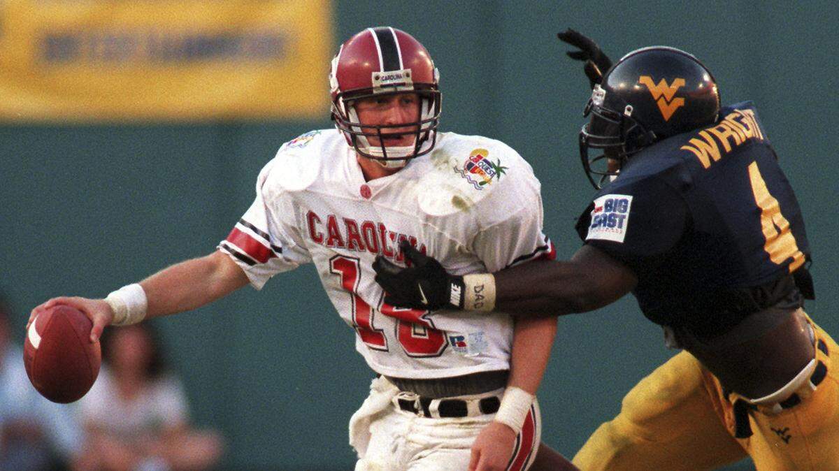Steve Taneyhill threw for 227 yards and accounted for two touchdowns in the CarQuest Bowl win over Miami after the 1994 college football season.