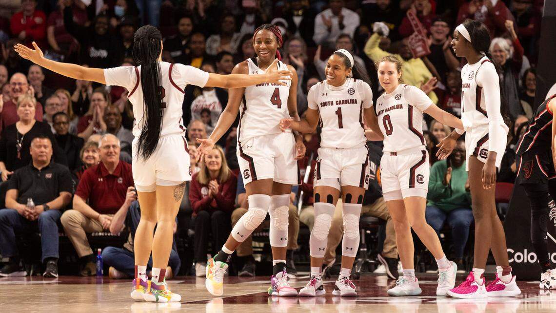 South Carolina guard Brea Beal (12) celebrates with her fellow senior teammates near the end of South Carolina’s win Sunday over Georgia at Colonial Life Arena.