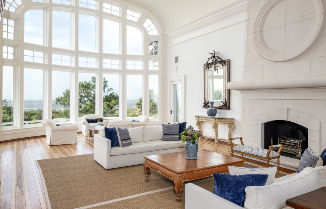 The Kiawah Island house covers 8,650 square feet and has heart of pine flooring with windows overlooking the Atlantic Ocean.