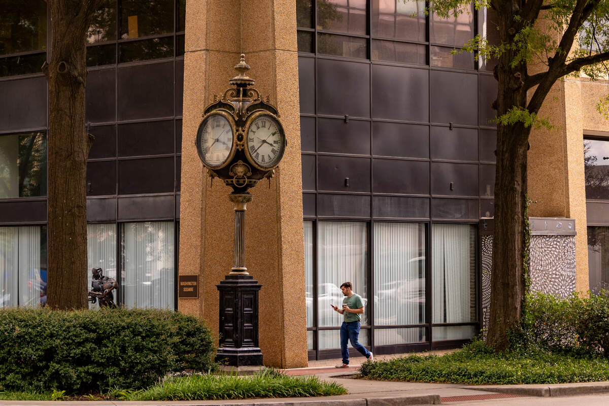 The four-sided clock at Main and Washington Streets was donated to the city from Standard Savings and Loan.