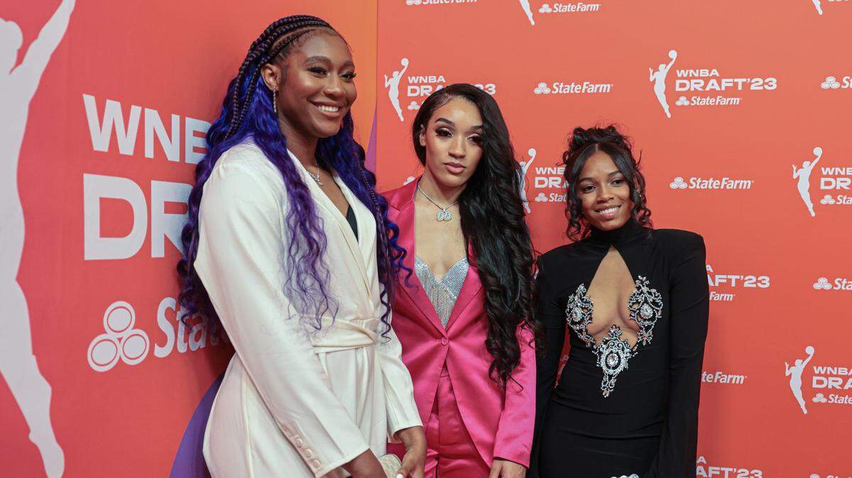 Aliyah Boston, Brea Beal and Zia Cooke pose for a photo before the WNBA Draft 2023 at Spring Studio.