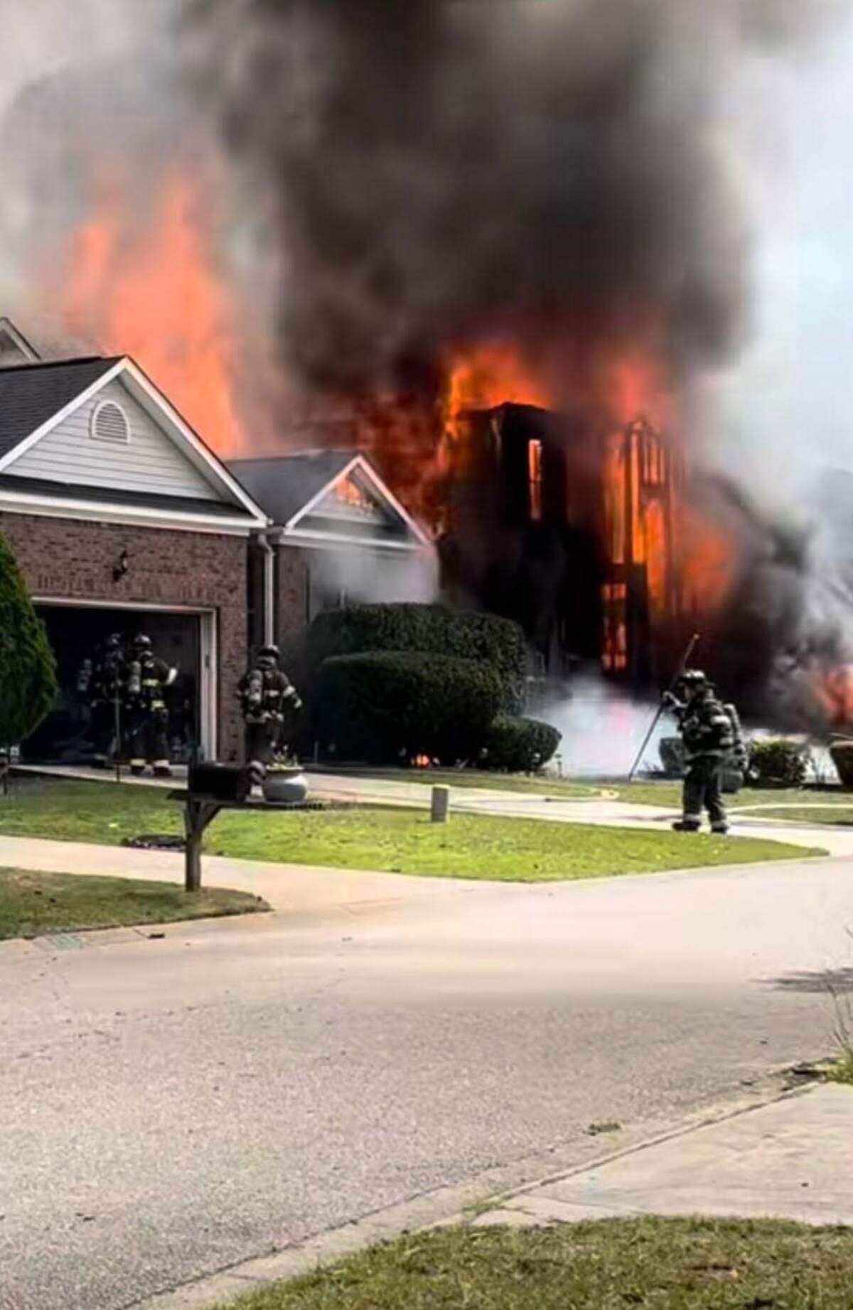 Members of the Columbia Fire Department respond to burning buildings.