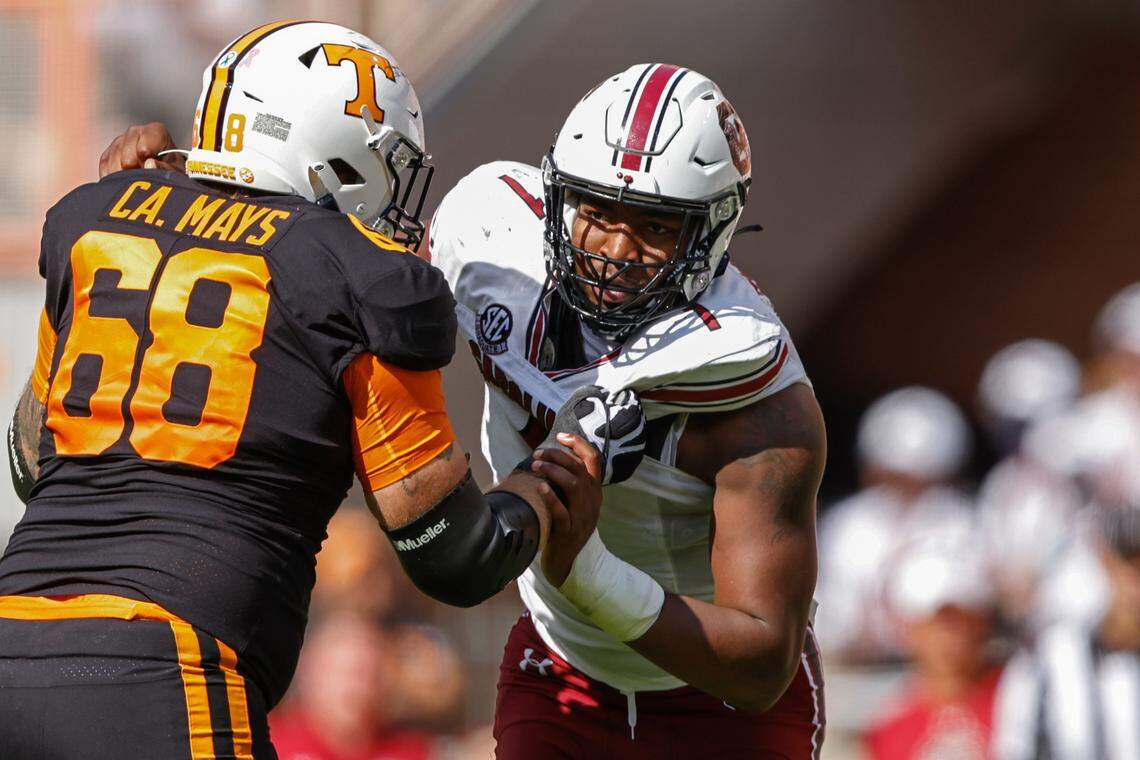 South Carolina defensive end Kingsley Enagbare (1) rushes as he’s blocked by Tennessee offensive lineman Cade Mays (68) during the second half of an NCAA college football game Saturday, Oct. 9, 2021, in Knoxville, Tenn. Tennessee won 45-20. (AP Photo/Wade Payne)