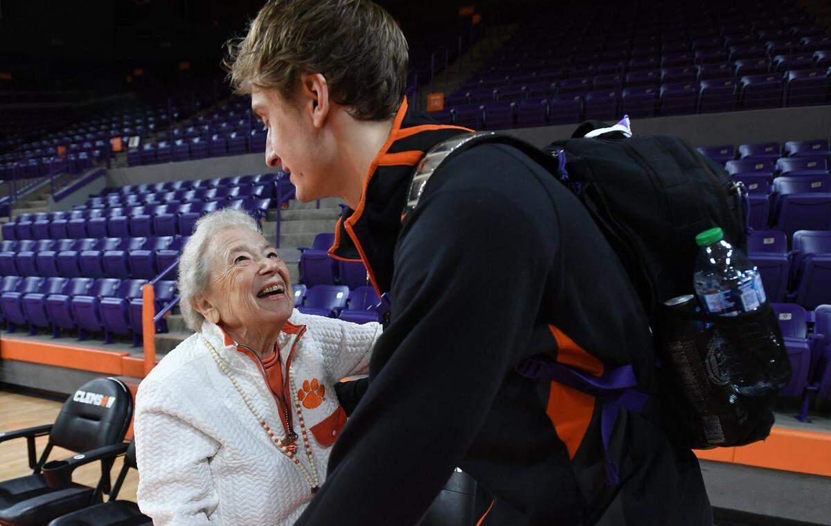 Clemson basketball fan Paula Grooms hugs Clemson forward Hunter Tyson after the Tigers’ game against Pitt on Jan. 22, 2022 at Littlejohn Coliseum.