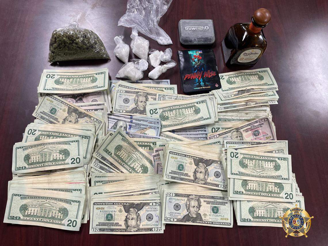 Drugs and cash were seized following a chase.