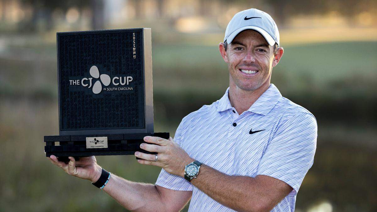 Rory McIlroy, of Northern Ireland, holds the winning trophy after the final round of the CJ Cup golf tournament Sunday, Oct. 23, 2022, in Ridgeland, S.C. (AP Photo/Stephen B. Morton)