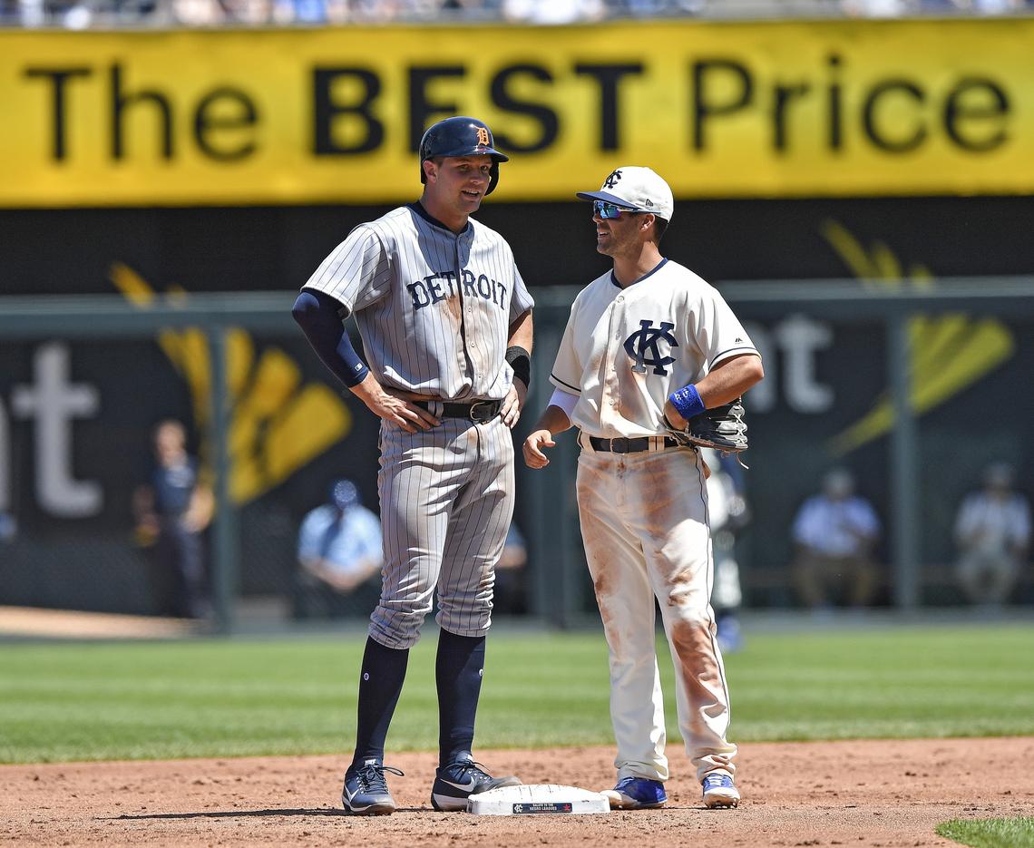 Detroit Tigers' Grayson Greiner talks with Kansas City Royals second baseman Whit Merrifield after Greiner reached second on a single by Leonys Martin in the third inning during Sunday's baseball game on May 6, 2018, at Kauffman Stadium in Kansas City, Mo.