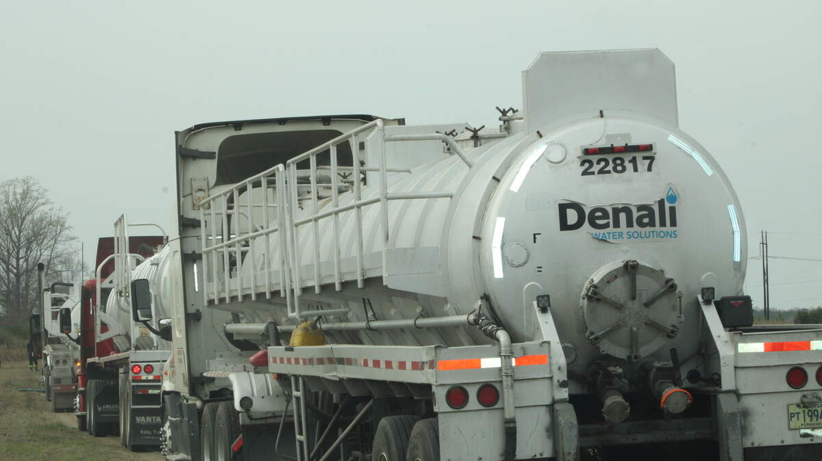 Some companies haul industrial sludge in huge tankers to South Carolina for use as a fertilizer on agricultural fields. There are concerns about the environmental impacts, even though supporters of spreading sludge say it’s good for crops. This photo was taken in March 2023 during a spreading operation in Darlington County.