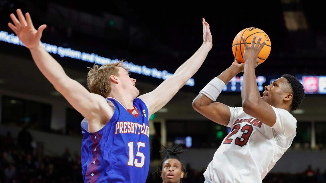 South Carolina’s GG Jackson (23) shoots asPresbyterian’s Owen McCormack (15) pressures during the first half of action in the Colonial Life Arena on Sunday, Dec. 11, 2022.