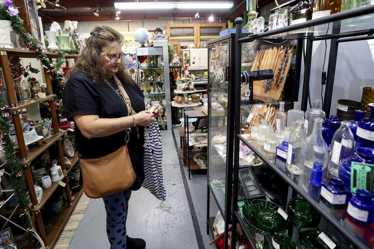 Teresa Miller shops at Three Bad Dogs Antiques inside the Three Rivers Antique Mall in West Columbia. The mall has about 34 spaces for various dealers.