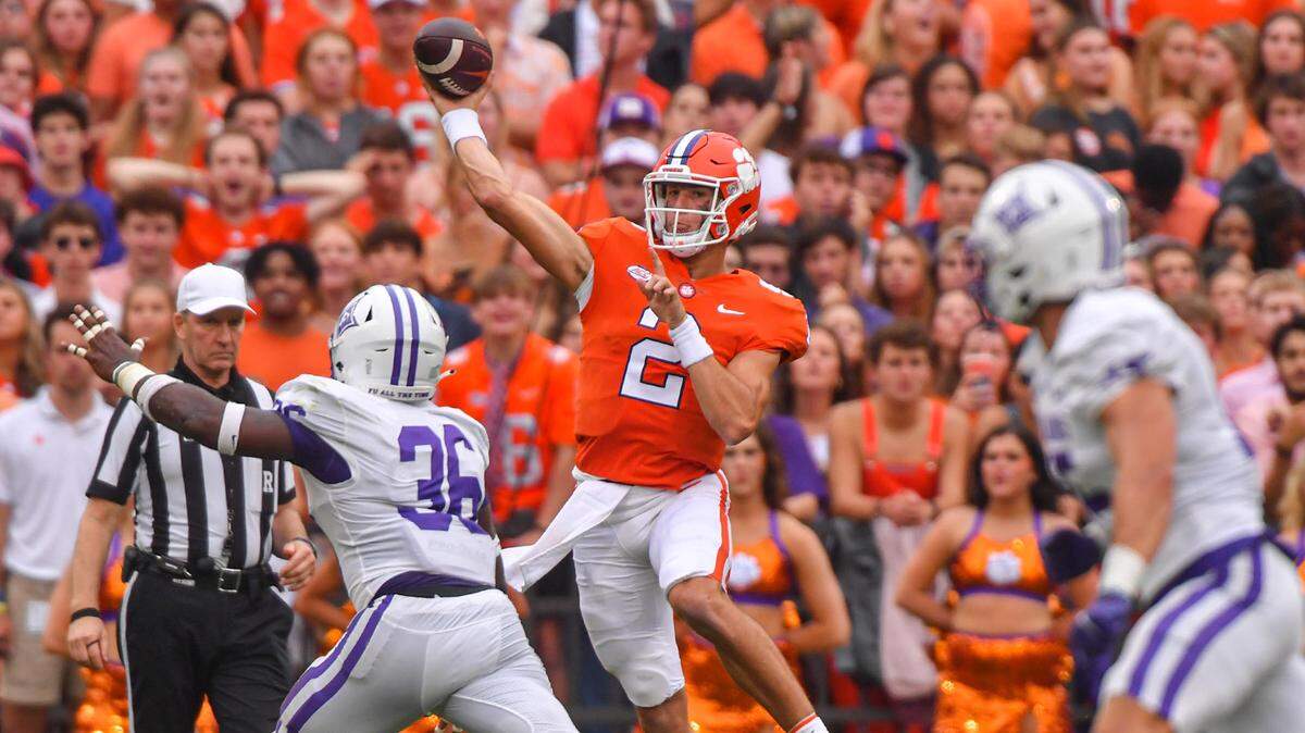 Sep 10, 2022; Clemson, South Carolina, USA; Clemson Tigers quarterback Cade Klubnik (2) passes the ball against Furman Paladins safety Jalen Miller (36) during the second quarter at Memorial Stadium. Mandatory Credit: Ken Ruinard-USA TODAY Sports