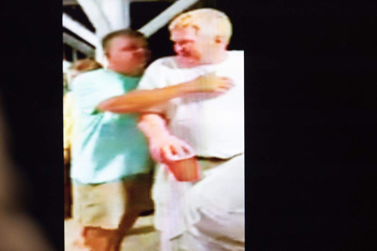 A video showing Chris Wilson hugging Alex Murdaugh is shown as evidence in Murdaugh’s trial for murder at the Colleton County Courthouse on Wednesday, Feb. 1, 2023. Joshua Boucher/The State/Pool