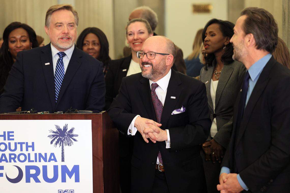 Republican strategist Dave Wilson, former SC Democratic Party chair Trav Robertson and Melrose Place actor Andrew Shue introduce SC Forum, a platform for political discussions at the South Carolina State House on Wednesday, February 25, 2026. Republican and Democratic Party leaders say that the new website will not have the same problems as other social media platforms that reward extreme views.