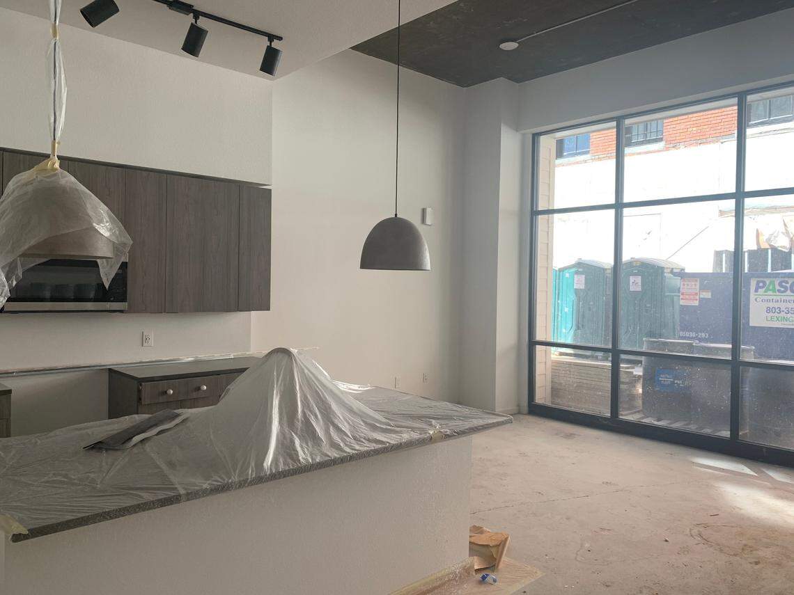 A first floor, three bedroom unit at The Lady apartments in Columbia will have courtyard access and features modern appliances and fixtures in the kitchen.