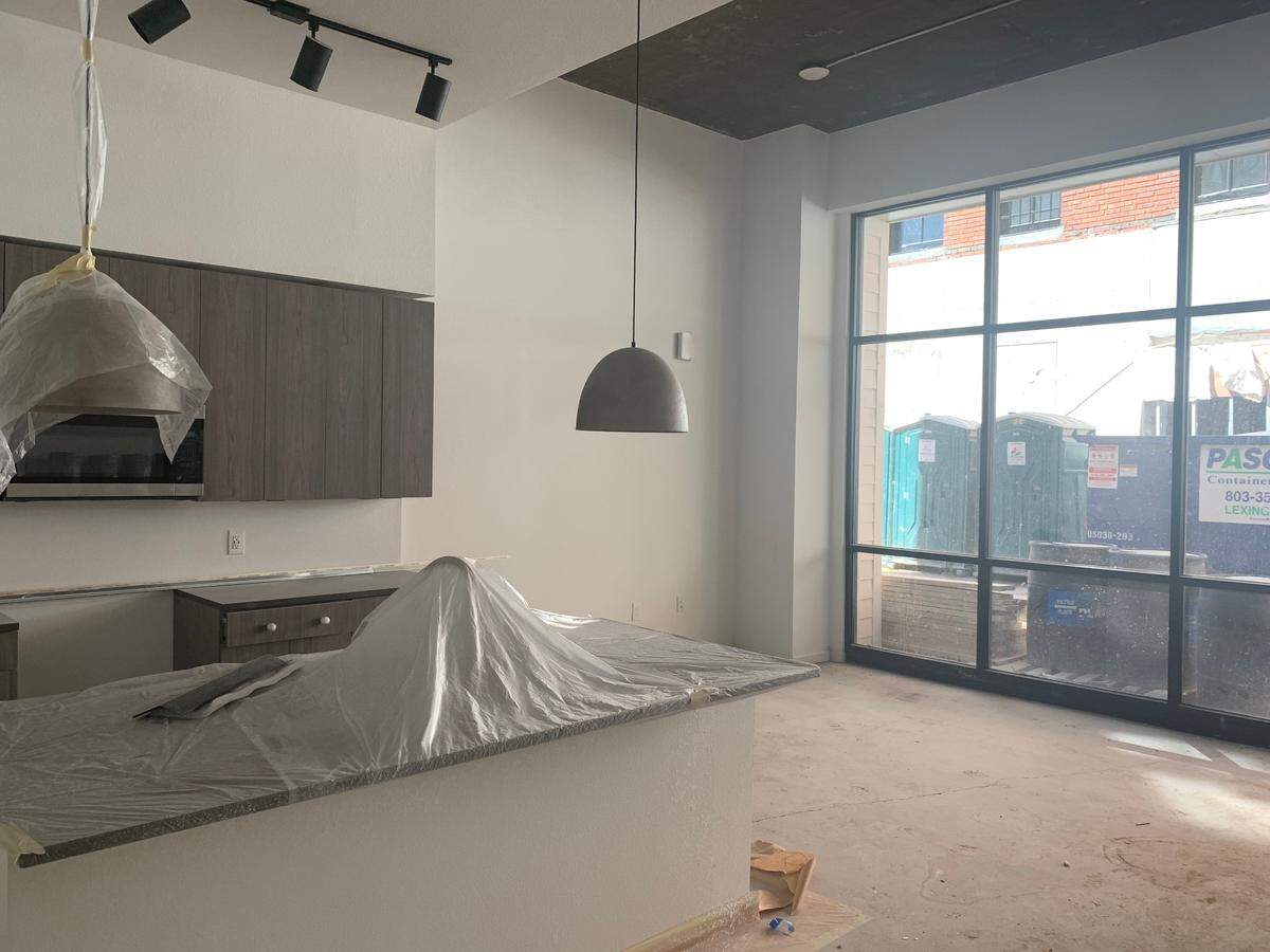 A first floor, three bedroom unit at The Lady apartments in Columbia will have courtyard access and features modern appliances and fixtures in the kitchen.