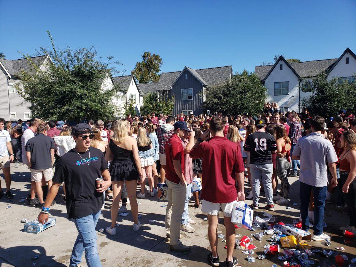 A crowd of at least a couple thousand people gathered at the Orchard rental complex, according to the Columbia Fire Department.