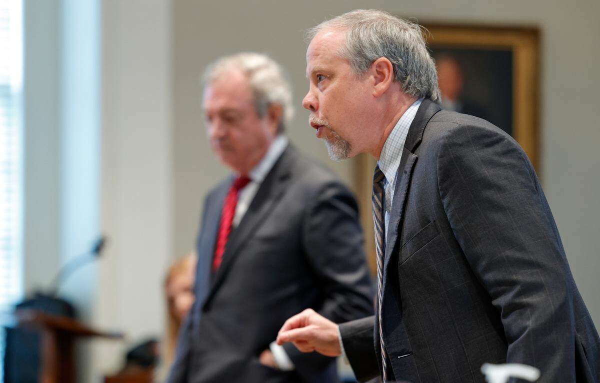 Defense attorney Dick Harpootlian and prosecuting attorney Creighton Waters discuss the release of evidence before Circuit Judge Clifton Newman during a judicial hearing in the Colleton County Courthouse on Monday, Aug. 29, 2022.