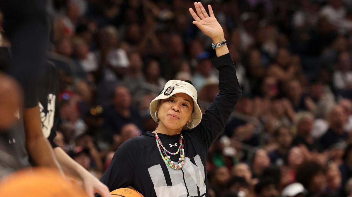 University of South Carolina Head Coach Dawn Staley acknowledges the crowd during an open practice in advance of the NCAA National Championship at Amalie Arena in Tampa, Fla. on Saturday, April 5, 2025.