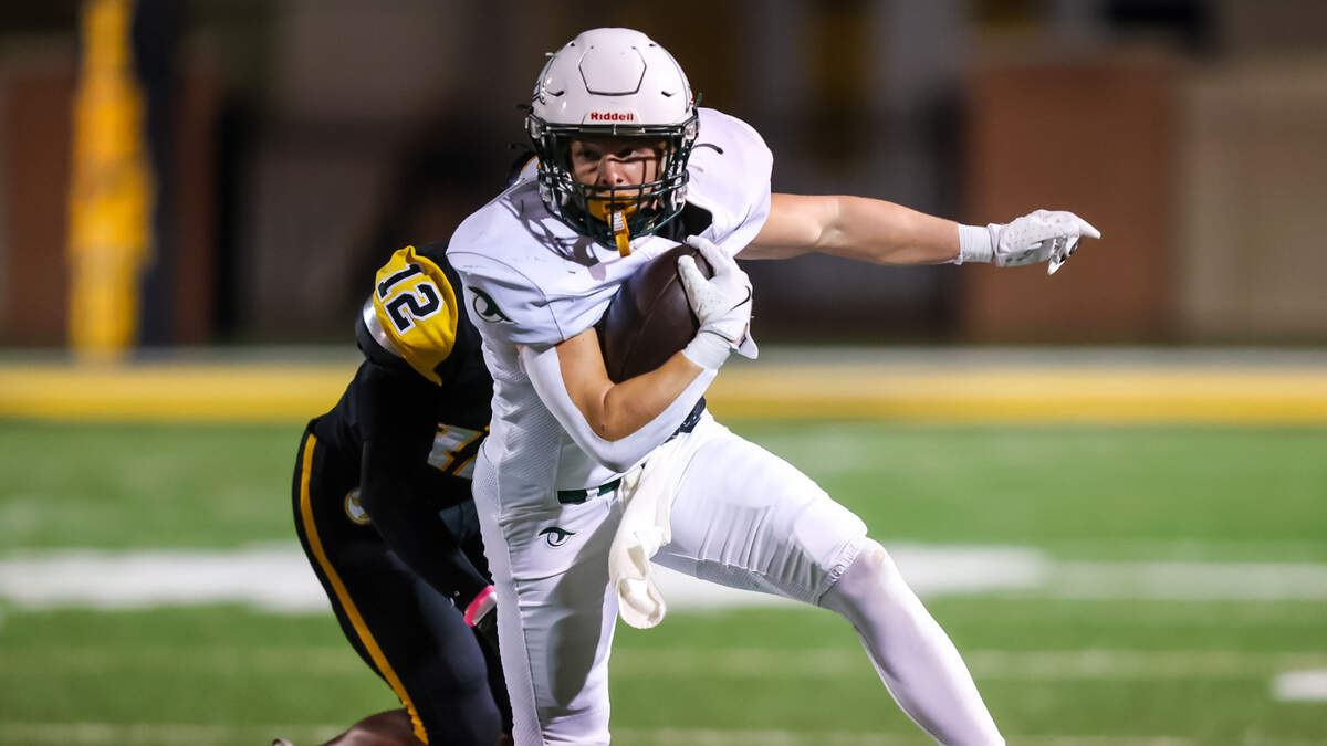 River Bluff Gators running back Hayden Myers (21) rushes against the Irmo Yellow Jackets during their game at Irmo High School in Irmo, SC, 10/11/24.
