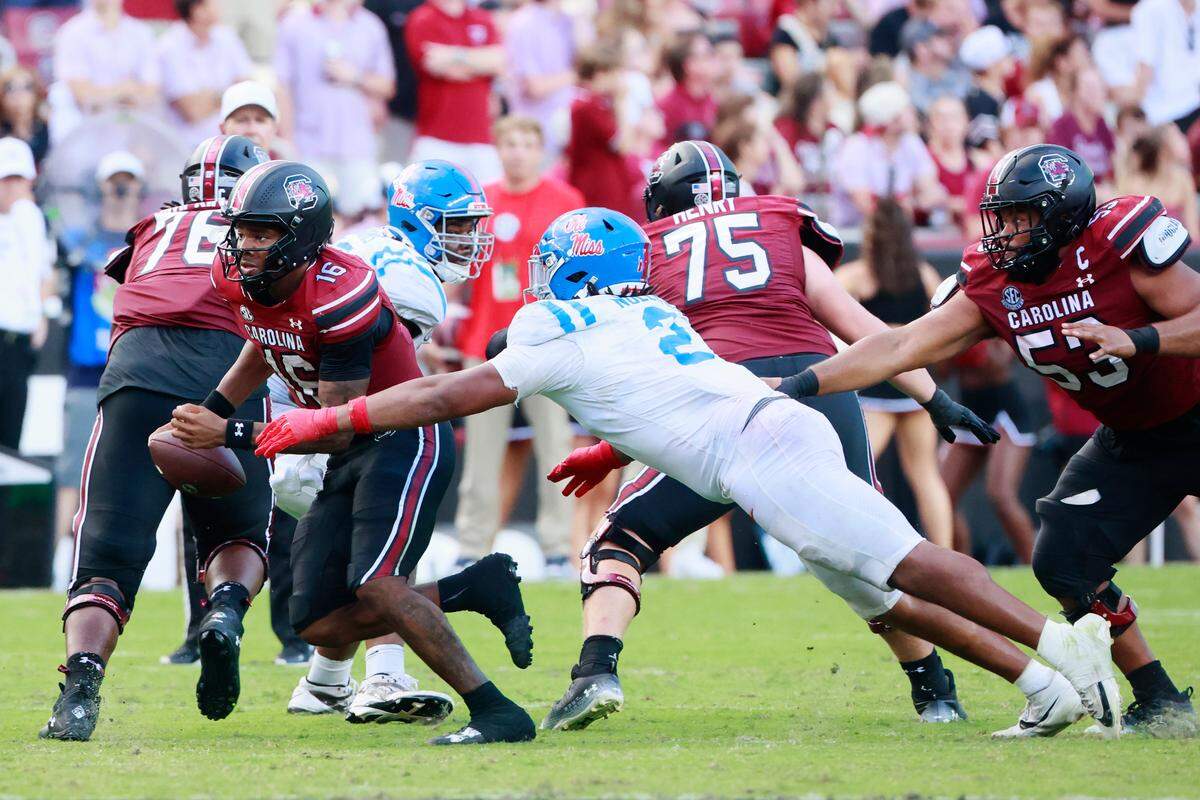 South Carolina quarterback LaNorris Sellers (16) is tackled by Mississippi defensive tackle Walter Nolen (2) on Saturday, October 5, 2024.