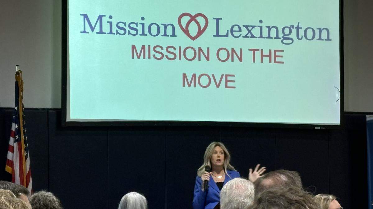 Mission Lexington CEO Amy Reeves speaks about the service organization’s move to a new, larger location at the Lexington Chamber of Commerce breakfast on Oct. 14, 2025.