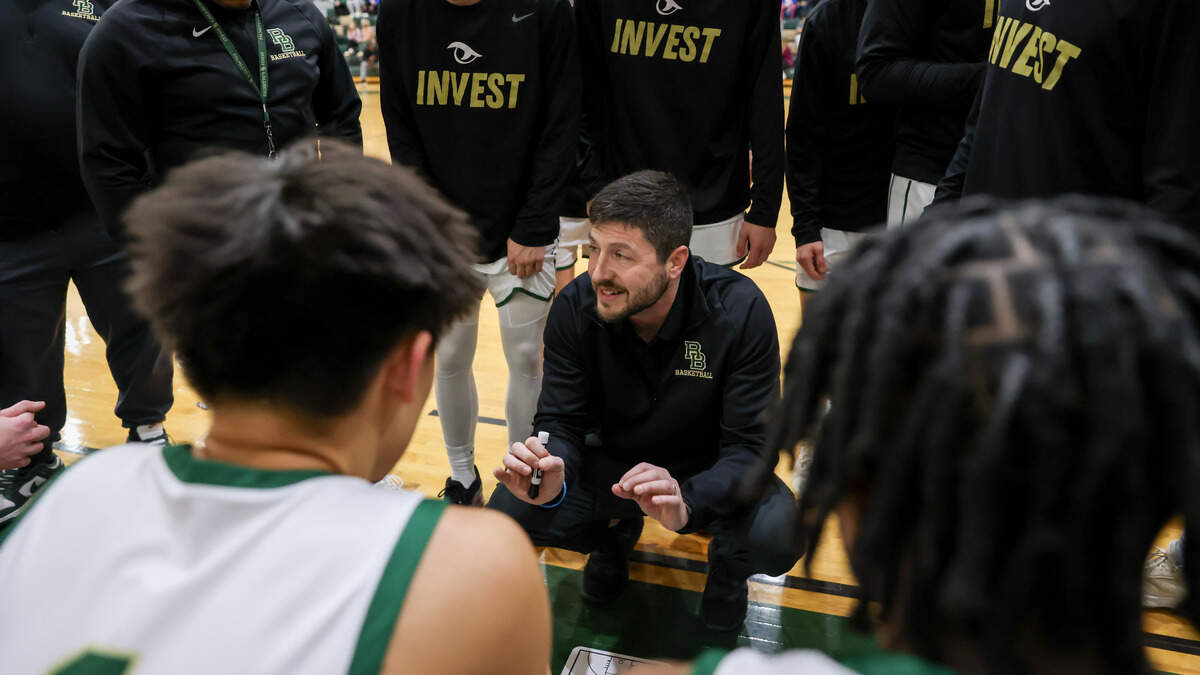 River Bluff head coach Ben Lee speaks with his team during River Bluff’s game against visiting Dutch Fork at River Bluff High School on Tuesday, January 28, 2025.