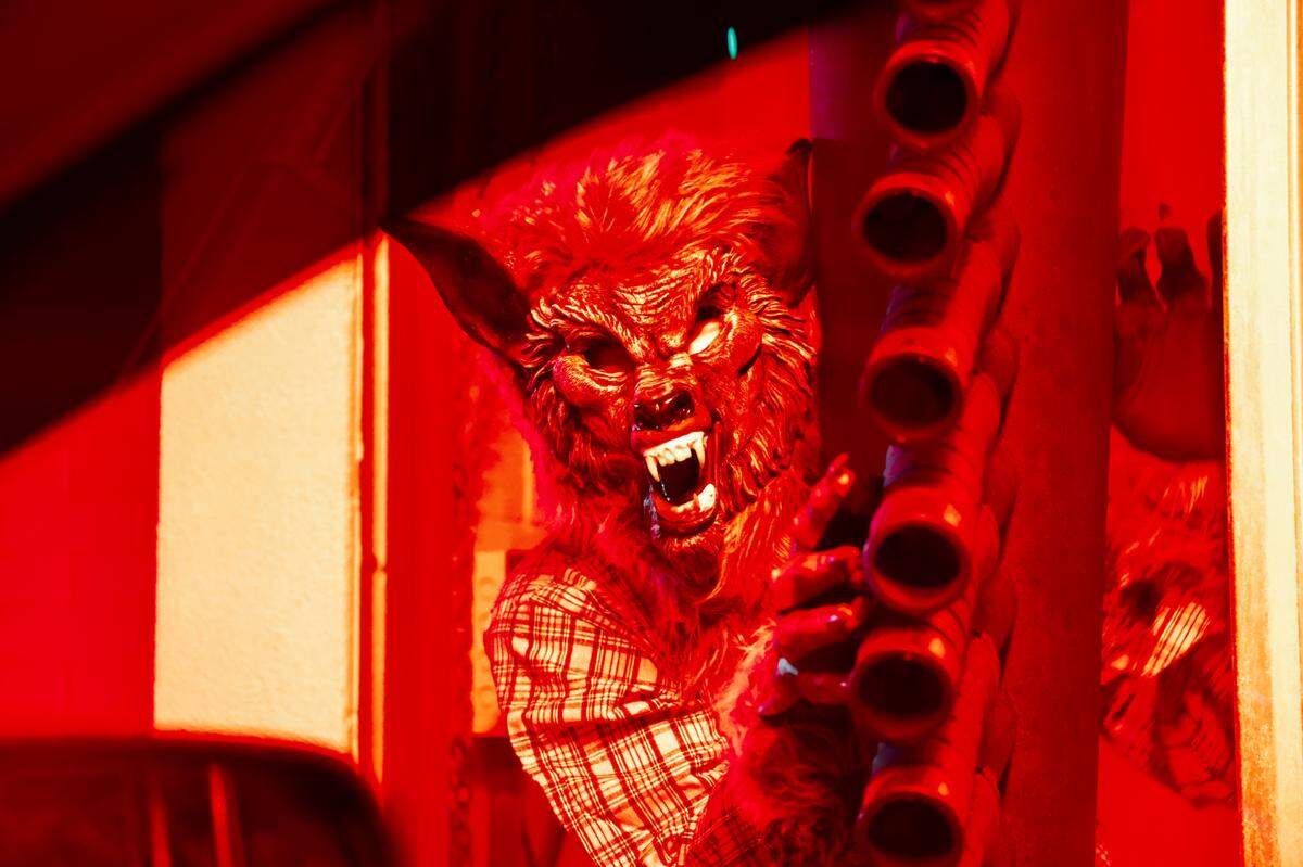 A scary ghoul peers out from the Hurricane Express Wash. The car washes are offering a haunted car wash experience through Halloween.
