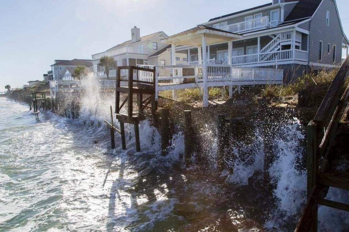 This seawall at Garden City, S.C’.s south end took the brunt of the ocean’s waves during a high tide in 2016. Seawalls protect property, but make erosion of the public beach worse. New walls are banned on South Carolina beaches. Disputes have surfaced in recent years about new seawall construction as property owners try to protect their homes from rising ocean levels.