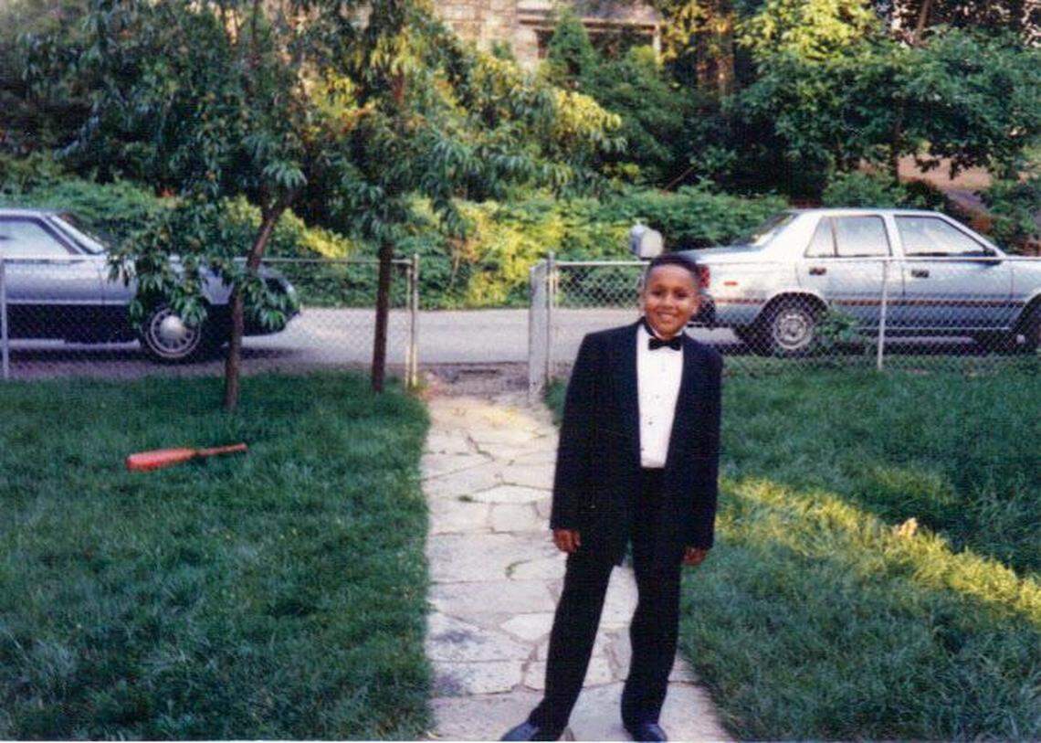 Mikal Mahdi is shown at age 8 in Baltimore in 1991.