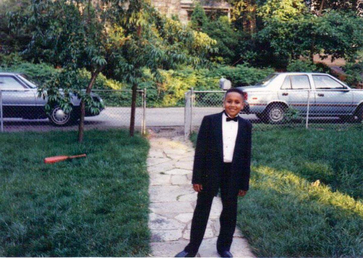Mikal Mahdi is shown at age 8 in Baltimore in 1991.