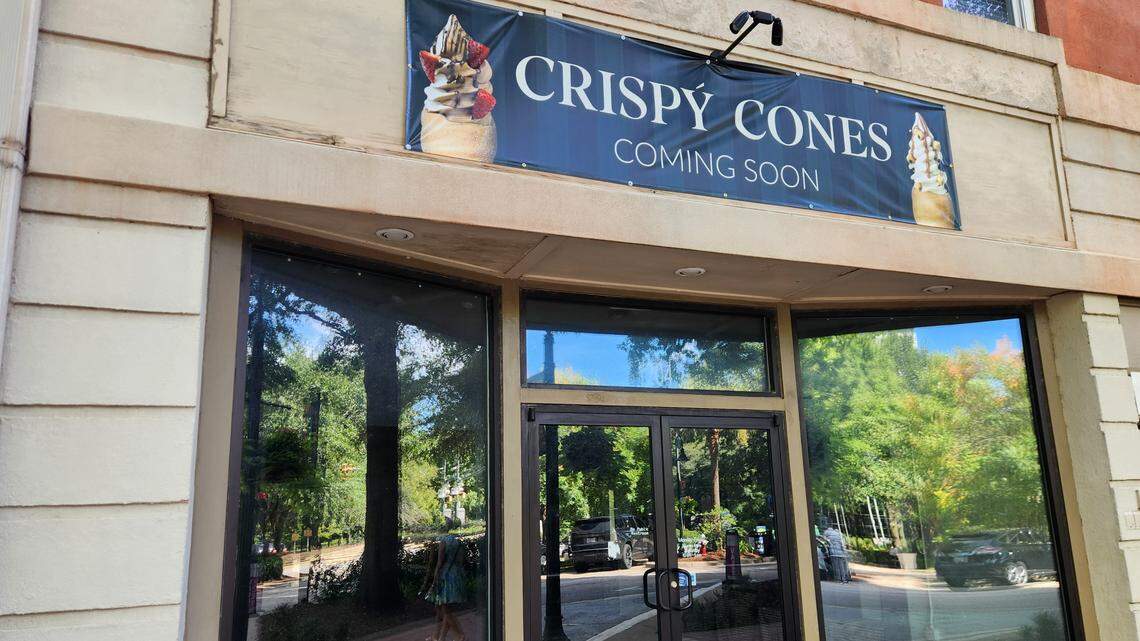 A banner announcing a Crispy Cones location is hanging at 1204 Main St. in Columbia near the SC Statehouse.