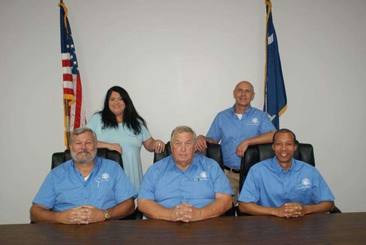 The Pine Ridge Town Council. Standing, from left, are Beth Spires Sturkie and Floyd Dinkins. Seated, from left, are Scott Sims, Mayor Robert Wells and Mayor Pro Tem Daniel Davis.