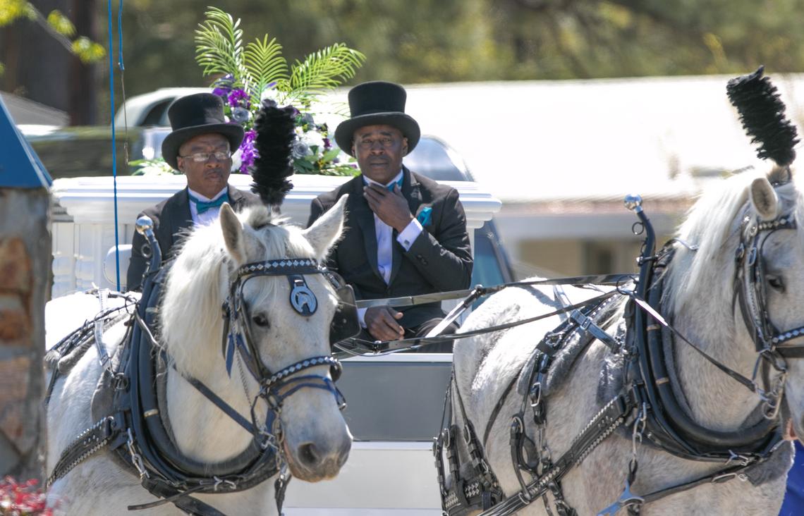 A horse-drawn caisson arrives outside Saints Center Ministries in Walterboro for a celebration of 10-year-old Raniya Wright’s life. 4/3/19