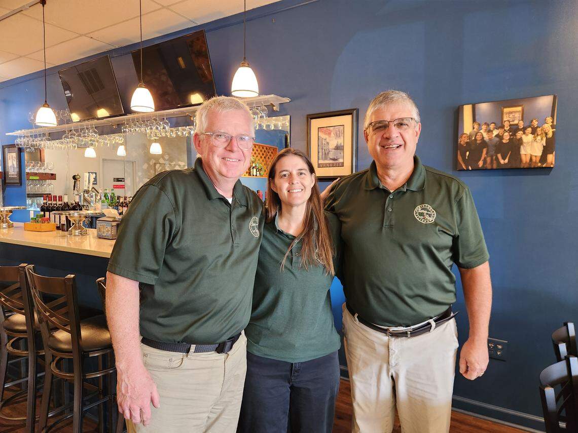 Clara and Ray’s Ristorante Italiano owners, from left, Brian Clancy, Tracey Immerso and John Immerso pose for a photo on Oct. 2, 2025 at the Lexington restaurant.