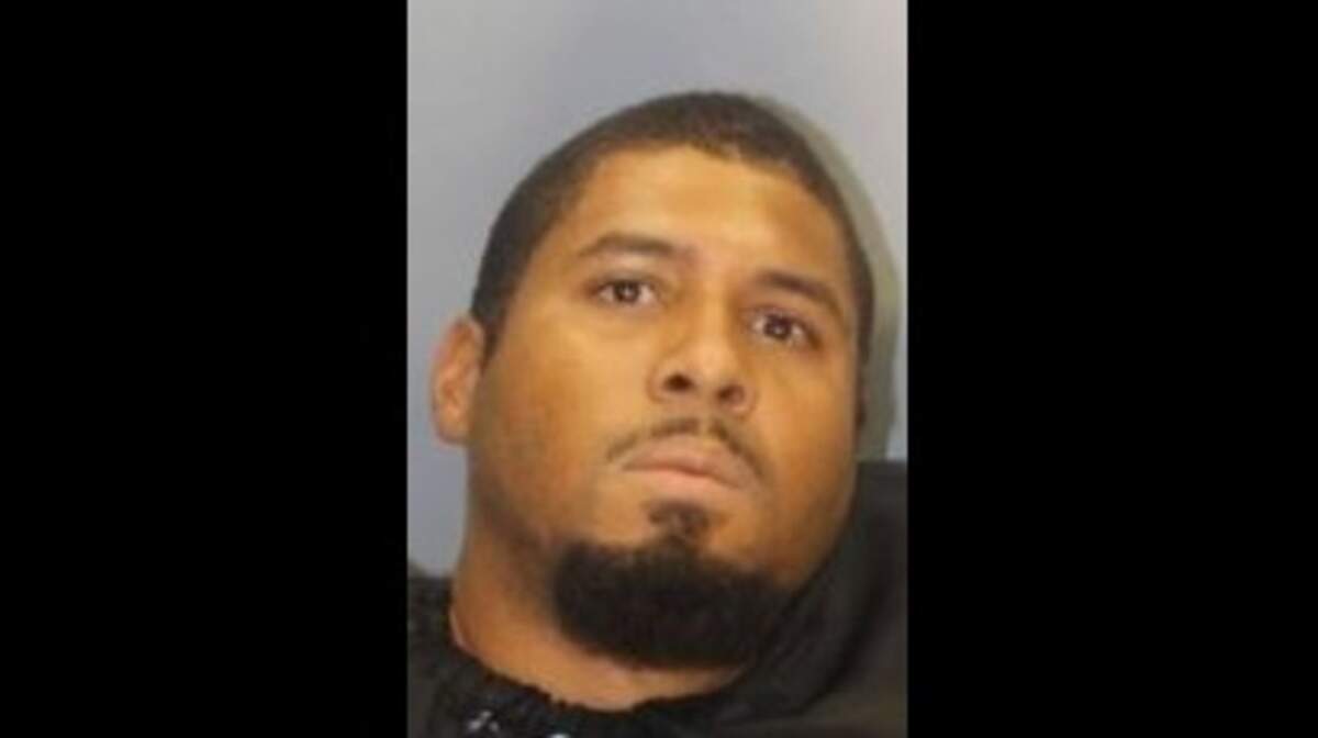 John Holmes was charged with second-degree assault and battery after attacking a security guard at a Columbia hotel.