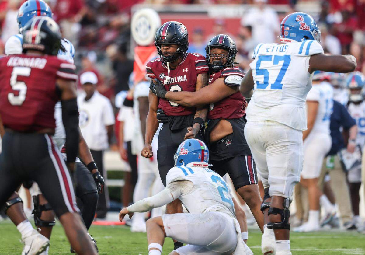 South Carolina edge Dylan Stewart (6) is held back after sacking Mississippi quarterback Jaxson Dart (2) during the second half of the Gamecocks’ game against Mississippi at Williams-Brice Stadium in Columbia on Saturday, October 5, 2024.