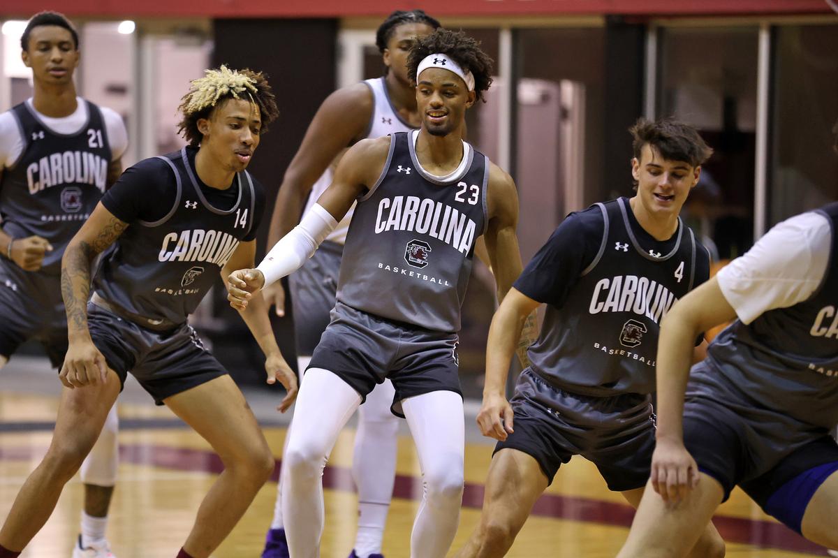 Cam Scott, center, and fellow South Carolina newcomers Lance Piper, left, and Weston Coggeshall during a summer basketball practice on Tuesday, July 30, 2024 inside Carolina Coliseum.