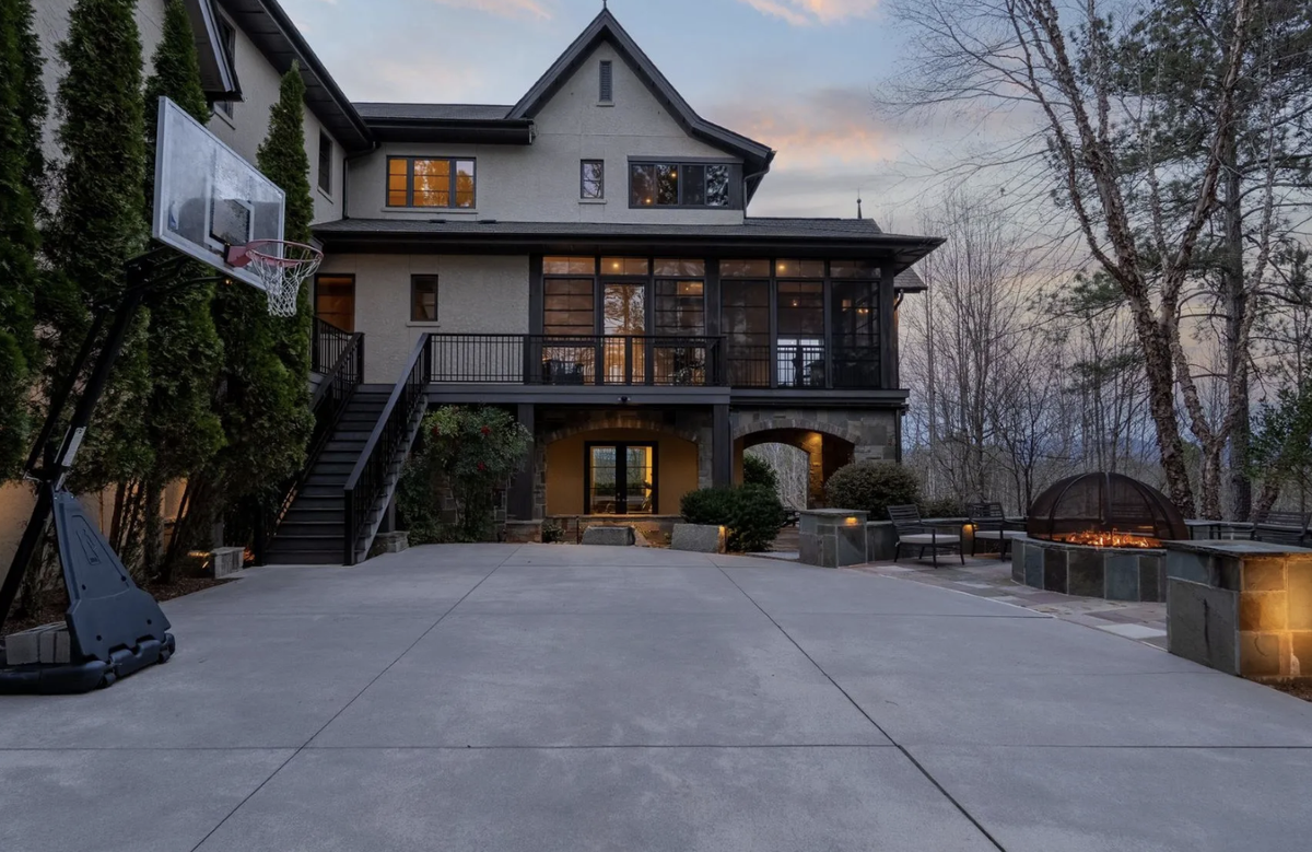 The basketball half court was built for the owner, a high school player, to enjoy with his sons.