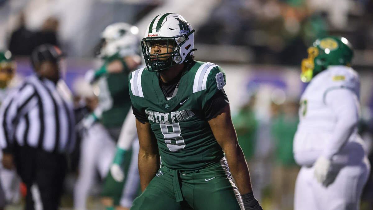 Julian Walker (8) of Dutch Fork celebrates a tackle during the SCHSL Class 5A Division I championship game between Dutch Fork and Summerville at Oliver C. Dawson Stadium in Orangeburg on Saturday, December 6, 2025.