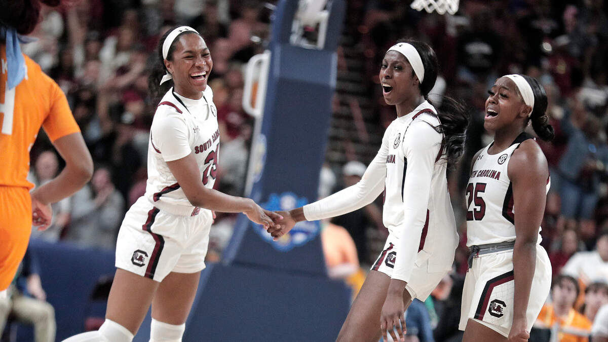 South Carolina’s Bree Hall celebrates after connecting for a 3-pointer against Tennessee during Sunday’s SEC tournament championship game at Bon Secours Wellness Arena in Greenville.