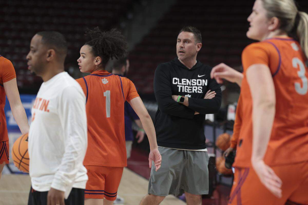 Clemson head coach Shawn Poppie watches his players run drills during their practice on Friday, March 20, 2026 before their NCAA Tournament First Four game against University of Southern California at Colonial Life Arena.
