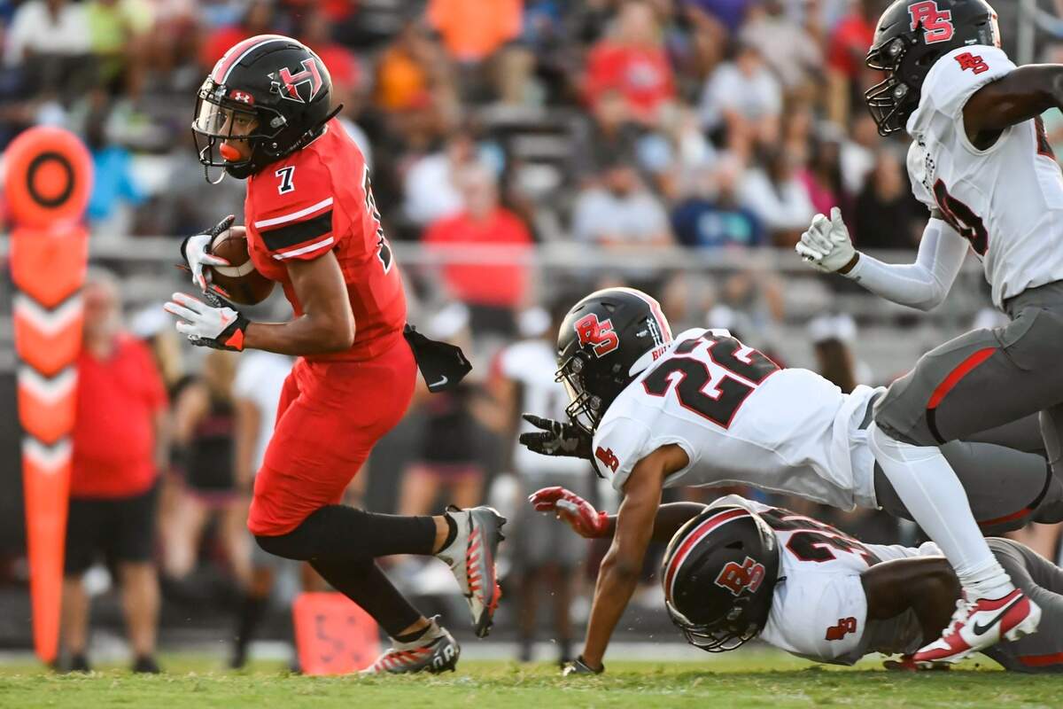 Hillcrest’s Avery Mcfadden (7) outruns Boiling Springs defense for a touchdown during a game at Hillcrest on Friday, Sept. 8, 2023.