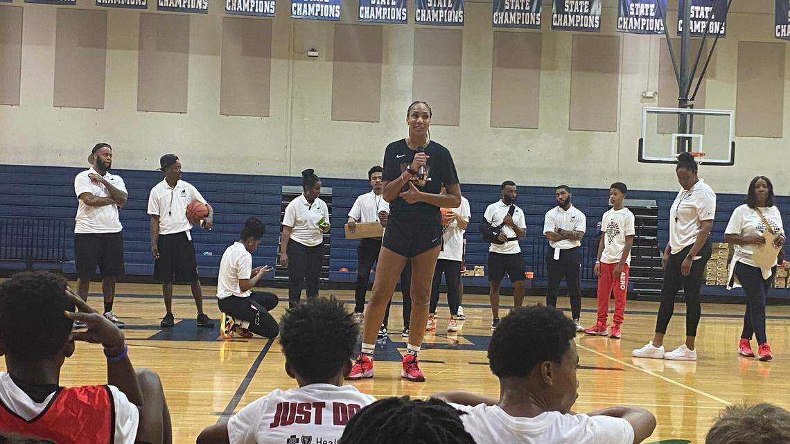A’ja Wilson speaks to kids at her basketball camp in November 2022