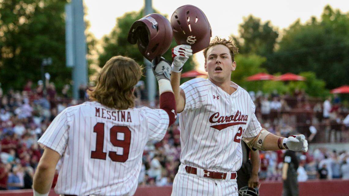 Cole Messina (19) congratulates Ethan Petry (20) are among the South Carolina Gamecocks team leaders this season.